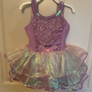 Purple sparkling dance outfit.